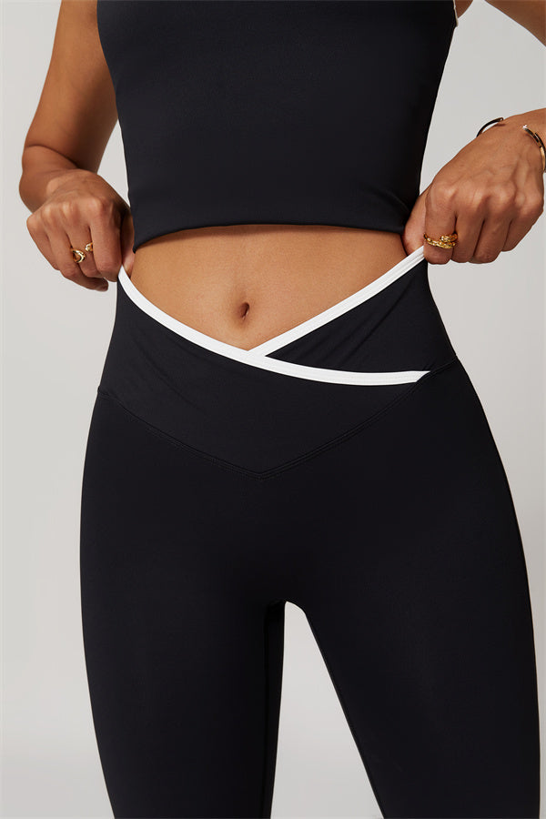 The Vela Cross Flare Pant - Peach Pink