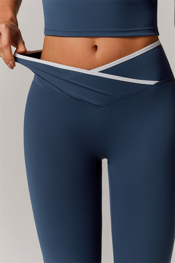 The Vela Cross Flare Pant - Peach Pink