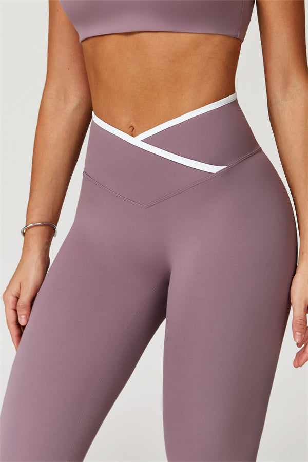 The Vela Cross Flare Pant - Peach Pink