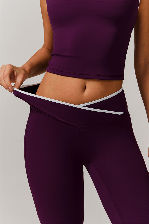 The Vela Cross Flare Pant - Peach Pink